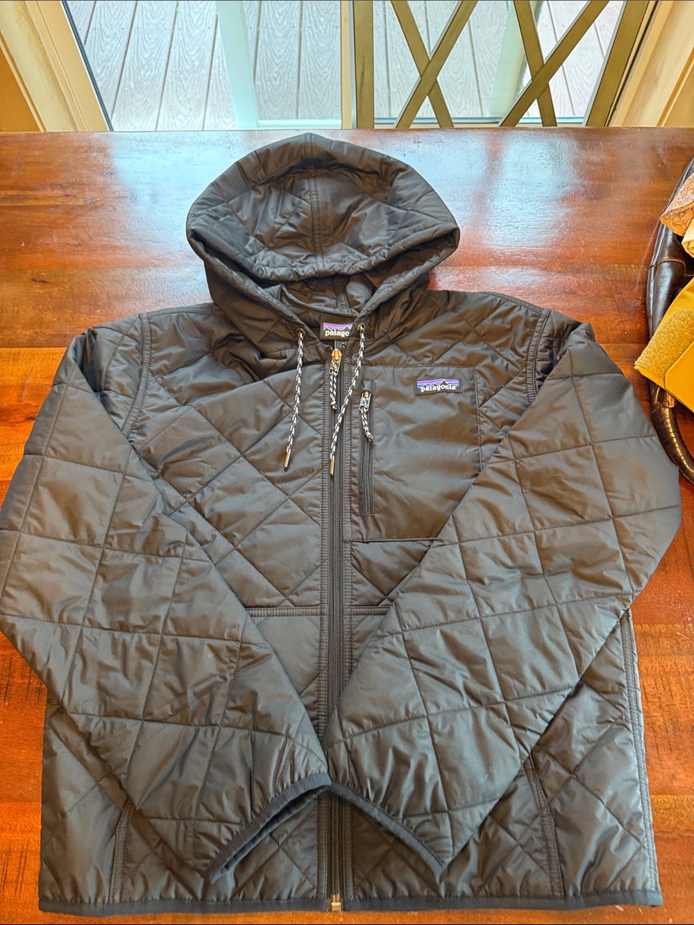 Women’s Patagonia brand new no tags. Black Quilted Puffer